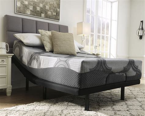 Ashley furniture is a furniture retailer that sells mattresses in addition to other types of home furnishings. The 12 Inch Ashley Hybrid Gray King Mattress & Adjustable ...