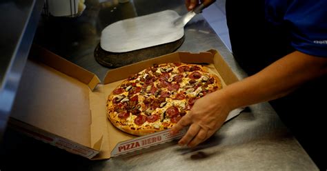 Domino's slices pizza prices in half this week