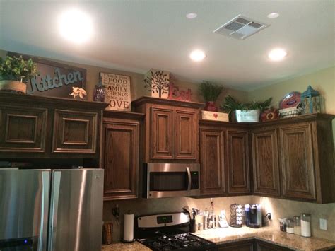 Tips for cleaning and organizing kitchen cabinets. Above kitchen cabinets decor. (With images) | Decorating ...