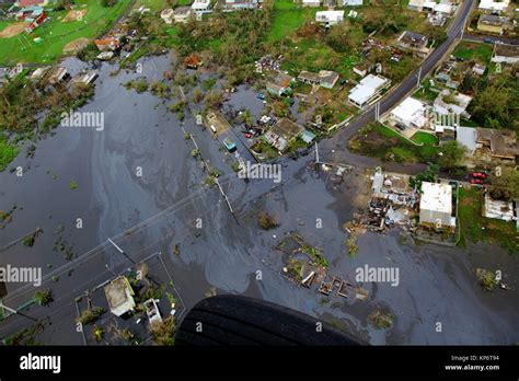 Aerial View Of Flooding And Damaged Homes In The Aftermath Of Hurricane