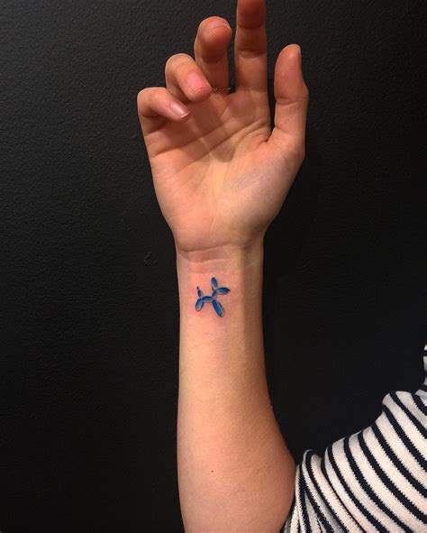 cute tiny wrist tattoos you ll want to get immediately glamour