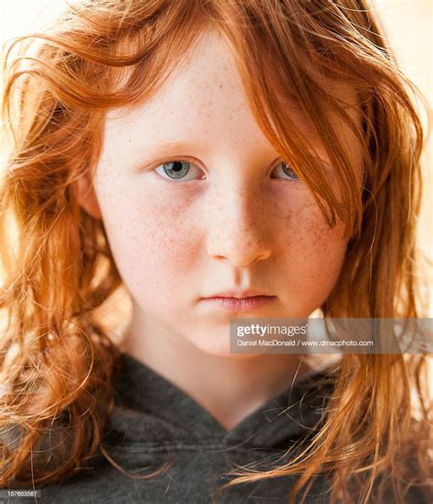 Portrait Of A Serious Young Girl With Red Hair Bildbanksbilder Getty