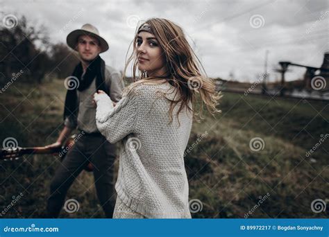 stylish hipster couple holding sensually hands boho gypsy woman stock image image of knitted