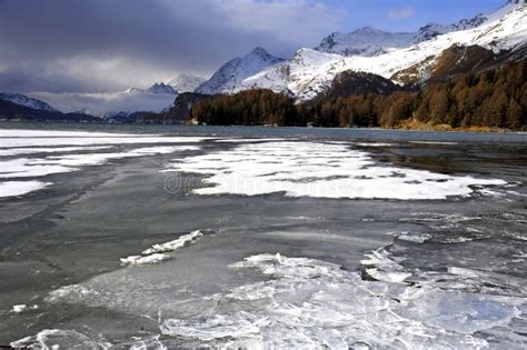 Scenic View Of Winter Snow Mountains Landscape And Frozen Lake In The