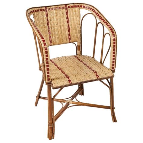 Who knew that french bistro chairs were a hot item right now? French 1900s Design Bistro Rattan and Wicker Armchair ...