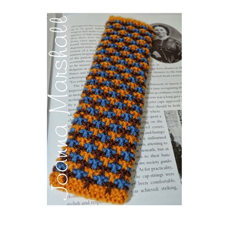 For beginners crayon bookmark measures about 26 cm all pieces of the bookmark are knitted flat. Oxford Texture Tweed Knitted Bookmark