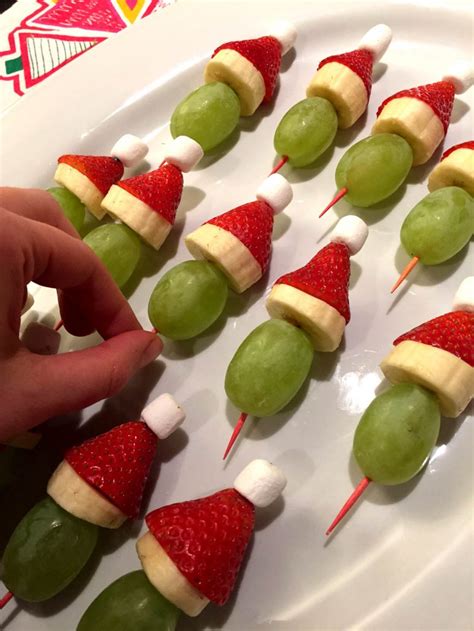 Christmas party recipes are sure to be festive and special. Grinch Fruit Kabobs Skewers - Healthy Christmas Appetizer, Snack or Dessert! - Melanie Cooks