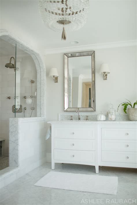 There's something about the luxe veiny stone that just makes a small the rest of the room is left white with just a few neutral accents to let the marble shine. Timeless White Marble Bathroom - Owens and Davis