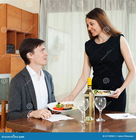 Loving Girl Serving Dinner To Beloved Man Stock Image Image Of