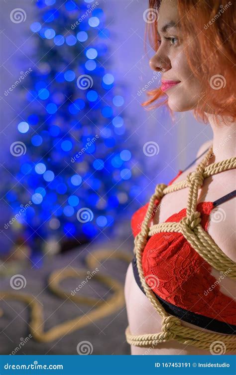 Redhead Girl Is Tied With A Rope Using The Japanese Shibari Technique