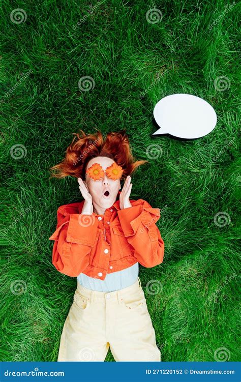 Wow Emotional Surprised Shocked Redhead Woman With Red Orange Gerbera