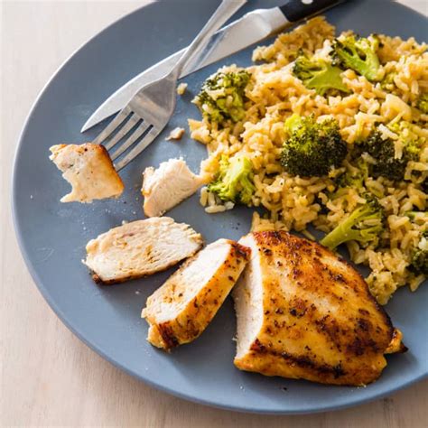 Tip the broccoli into the wok. One-Pot Chicken with Broccoli and Rice | Cook's Country