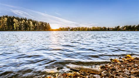 Lake Stones Trees Sun Horizon 4k Hd Wallpapers Hd Wallpapers Id 32006