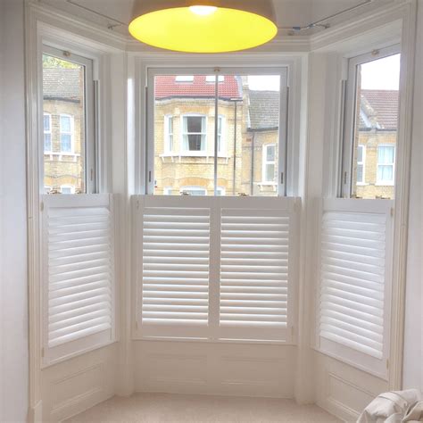 Bay Window Dressing | Cafe style shutters, Interior shutters, Bay