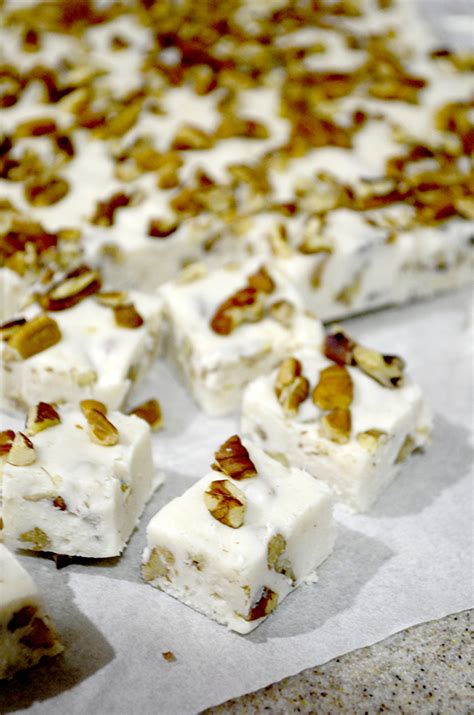 Creamy eggnog, sugar, marshmallows, white chocolate chips and almonds are combined to make this fudge that's perfect for the holidays. Eggnog Fudge Recipe - Pink Cake Plate