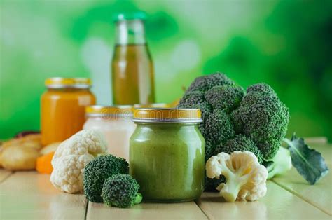 About 3% of these are baby puree. Broccoli Puree In Glass Jar On Wooden Background With Copy ...