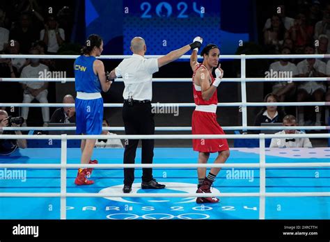 Algerias Imane Khelif Gestures After Defeating Chinas Yang Liu To Win