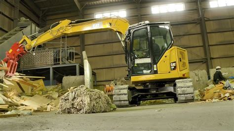 The large spacious cab provides a comfortable work area. Cat® 308 CR Mini Excavator Customer Story - Clean Network ...