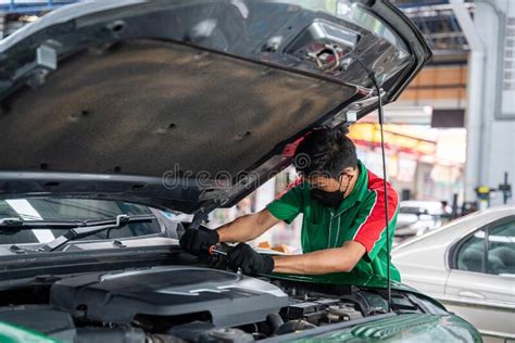 Auto Mechanic Fixing Repairing Car Engine Automobile Vehicle Parts