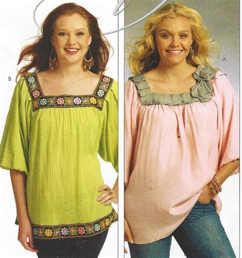 Two Women Wearing Blouses And Jeans One In Green And The Other In Pink