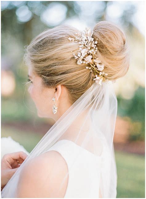 Bun hairstyles are popular wedding hairdos, and look good for different hair length. Bridal bun by Emily Artistry with BHLDN hairpiece || The ...