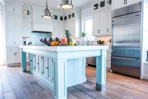 We'll even help you design your kitchen, step by step. Coastal Style White Kitchen with Blue Island - Crystal ...