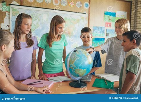 Schoolchildren In A Geography Lesson Stock Photo Image Of Together