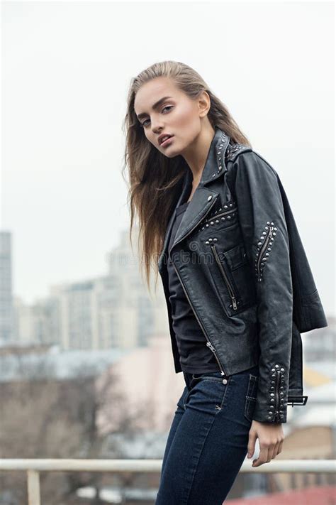 Urban Girl Posing In A Leather Jacket On A Rooftop Stock Photo Image