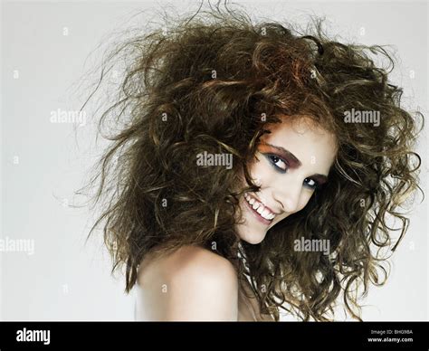 Young Woman With Curly Hair Stock Photo Alamy