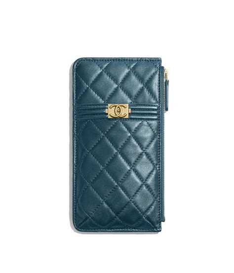 The chanel boy bag continues to actively sell, and sell fast, inspiring a lust in consumers all over the world, nearly ten years after it was released. Metallic Lambskin & Gold Metal Blue BOY CHANEL Phone & Card Holder | CHANEL