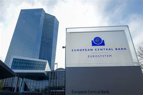 The European Central Bank Sign In Front Of Some Tall Buildings