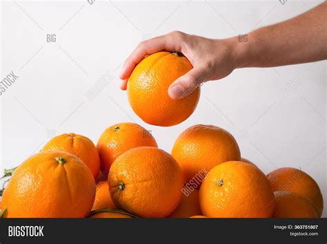 Person Taking Orange Image And Photo Free Trial Bigstock