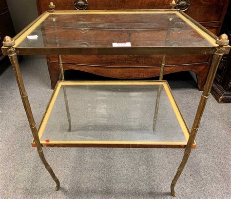 Check spelling or type a new query. A pair of gilt brass two tier glass topped tables, with bamboo supports, 59 x 46 x 40cm (2) in ...