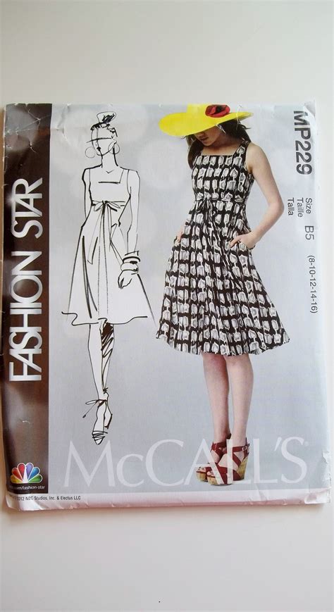 Misses Raised Waist Dress With Tie Belt Mccalls Mp229 Sewing Pattern