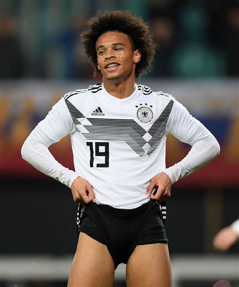 Career stats (appearances, goals, cards) and transfer history. LEIPZIG, GERMANY - NOVEMBER 15: Leroy Sane of Germany ...