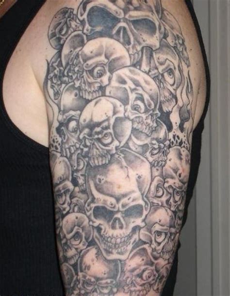 Gray Ink A Lot Of Skulls Tattoo On Half Sleeve Tattooimagesbiz