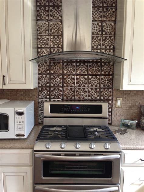 The final strip of old tile is covered with a trim piece. Dramatic Tin Backsplash - Contemporary - Kitchen - Tampa ...