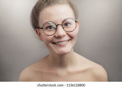 Pleasant Nude Woman Wearing Round Glassesisolated Stock Photo