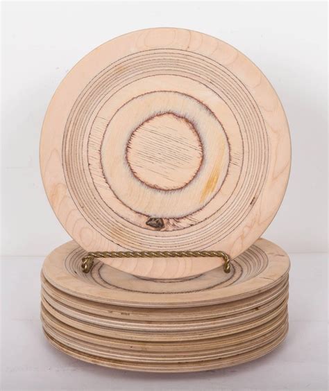 Set Of Eight Midcentury Eero Saarinen Wood Plates At 1stdibs