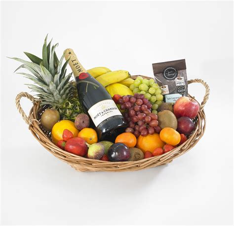 That's a combo holding the rich taste of chocolates and the aromatic bloom of flowers in a single gift. Champagne and Chocolate Fruit Hamper - Fruit Factory