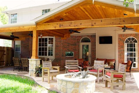 patio cover with stone and cedar texas custom patios