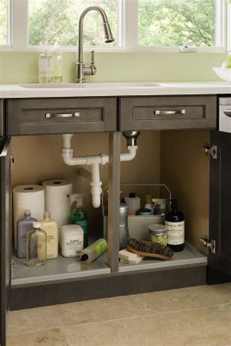 Rather than replacing the cabinets altogether, the homeowners is merely enhancing the old ones already installed in her or his kitchen. Sink Base Cabinet with Tilt-Out - Kitchen Craft