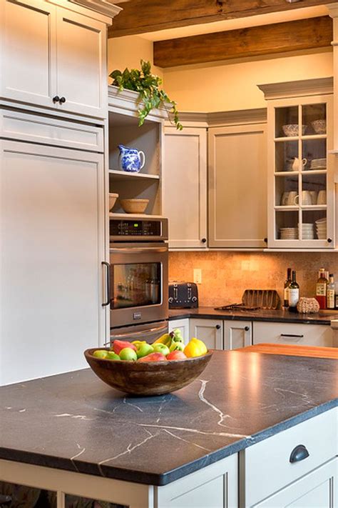 While their stone is beautiful, steatite (soapstone) is only white when composed of pure talc (which is unsuitable for architectural applications). Green Soapstone Countertops and Off-White Cabinets. | Green kitchen countertops, Soapstone ...