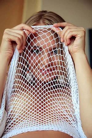 The Naked Body Of Blonde Teen Rachel Blau Is Clearly Seen Through Her Fishnet Cloths