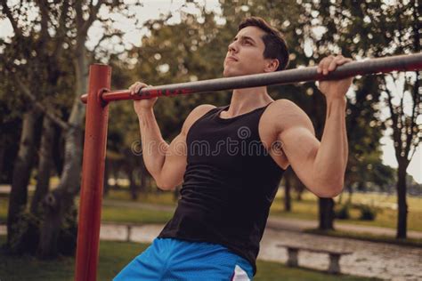 shirtless athletic man doing flying kick in the park stock image image of fight speed 166693741