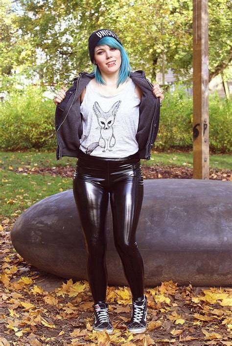 Black Stretch Pvc Pants Worn With Grey Tank Top With Fox Drawing Black Jacket And Sneakers