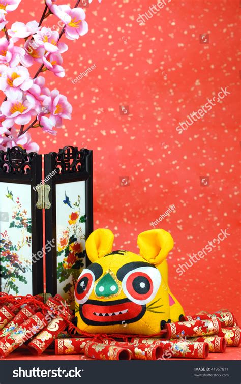 Traditional Chinese Cloth Tiger And New Year Ornaments On A Festive
