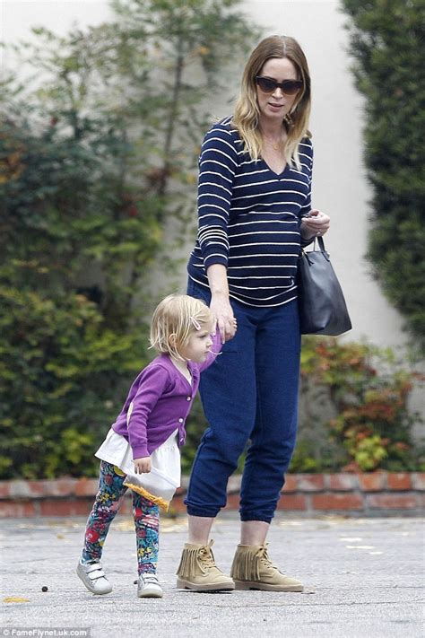 Mother, father, siblings, husband and kids. Emily Blunt highlights her baby bump in horizontal stripes ...