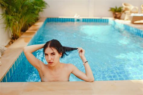 Brunette Girl Relaxing In The Pool Stock Image Image Of Bikini Slim