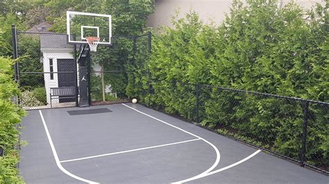 Can you play basketball on grass? 15' x 37' basketball court makes great use of a side yard ...